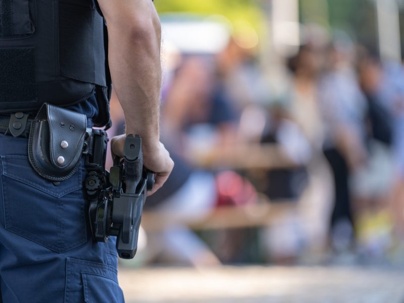 Police officer with weapon stock photo via Getty Images