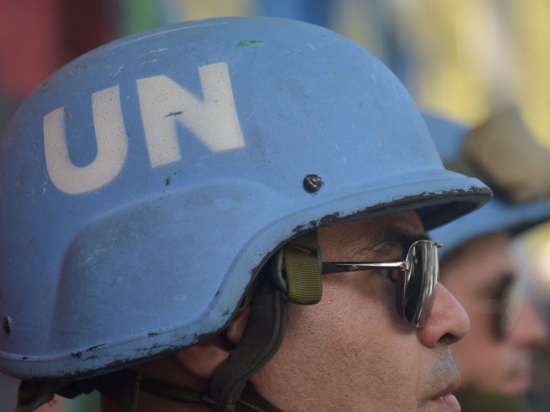 Brazilian military members from United Nations Stabilization Mission in Haiti stand guard on a street near the Republic of Chile School in Port-au-Prince, March 27, 2017. Photo credit HECTOR RETAMAL/AFP via Getty Images